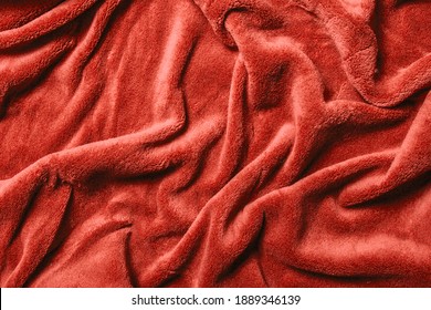 Soft Fabric Background. Red Blanket Texture. Wave Material Pattern. Decorative Curtain Textile Background.