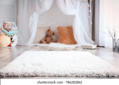 Soft Fluffy Carpet In Child Room