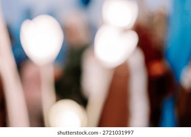 A soft focus background featuring blurred lights and warm, cool color gradients, creating a dreamy and ethereal effect suitable for design elements or overlays.