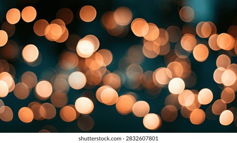 A soft focus background featuring numerous warm orange bokeh lights against a dark teal backdrop, creating a magical and festive atmosphere.