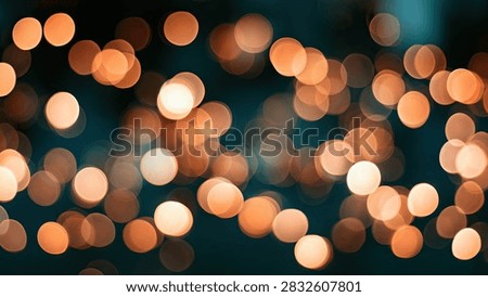 A soft focus background featuring numerous warm orange bokeh lights against a dark teal backdrop, creating a magical and festive atmosphere.