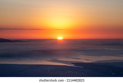 Soft focus. Beautiful Arctic sunset. Panoramic scenic colorful sky at dawn. Aerial view. Sunrise bright sky with White Sea. Top View from high altitude. - Powered by Shutterstock