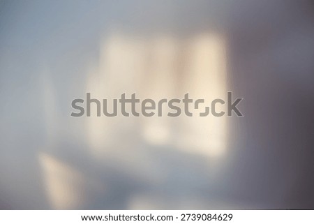 Soft focus beige blur texture wall with prism refraction. Light and shadow smoke abstract gray gradient rays background.