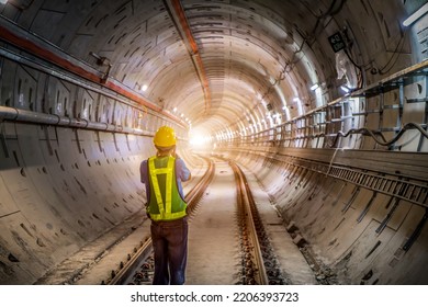 Soft focus and blurred lighting background of focus at engineer or technician control. Underground tunnel infrastructure. Transport pipeline by Tunnel Boring Machine for electric train subway