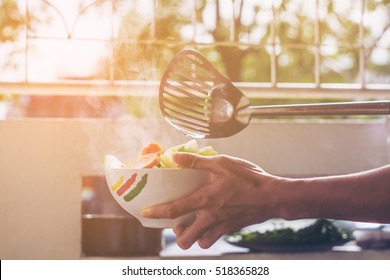 Soft Focus Bowl Of Hot Food With Steam