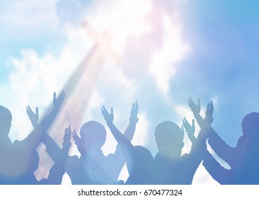 soft focus of christian people group raise hands up worship God Jesus Christ together in church revival meeting with image of wooden cross over cloudy sky can be used for Christian worship background - Shutterstock ID 670477324