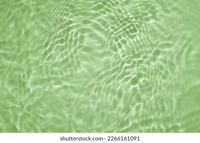 Soft focus cosmetic moisturizer water toner or emulsion green herbal extract abstract background - Shutterstock ID 2266161091