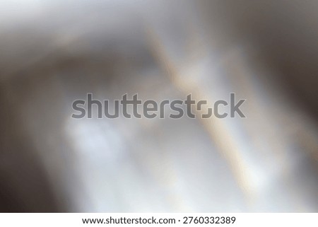 Soft focus gray blur texture wall with prism refraction. Light and shadow smoke abstract gradient reflection rays background.