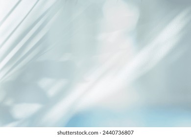 Стоковая фотография: Soft focus gray grain texture refraction wall. Light and shadow smoke abstract copy space background. 