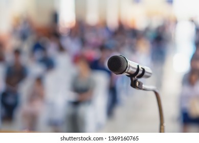 Soft Focus Of Head Microphone On Stage Of Student Parents Meeting In Summer School Or Event Whit Blurred Background,Education Meeting On Stage Concept And Copy Space,selective Focus To Head Microphone