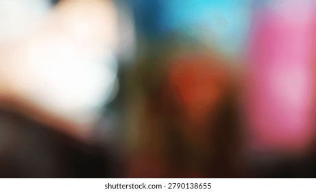 Soft focus image featuring a blend of vibrant colors and indistinct shapes creating an abstract artistic background