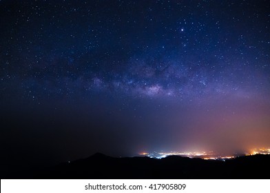 Soft Focus Of The Milky Way Galaxy On City Light At Chaing Mai.Thailand.Background