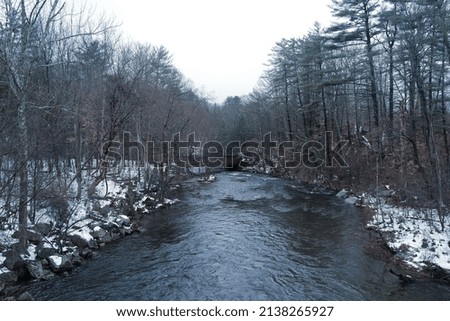 Soft focus of Natural landscape of roadside and river covered with snow