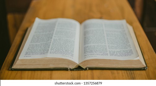 Soft focus the old holy bible with copy space on wood,Sunday reading concept.