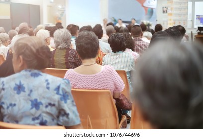 Soft Focus At Old People In The Seminar Event. Many Elderly In The Conference Room. Composing Picture With Soft Light. Concept Of Seniors Seminar , Health Care And Medical