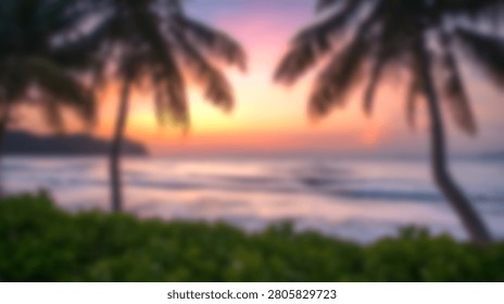 A soft focus out of focus background image of a tropical beach during a vibrant pink and orange sunset with silhouetted palm trees and ocean waves