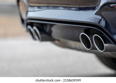 A Soft Focus Of A Quad Pipe Exhaust Of A Modified Car