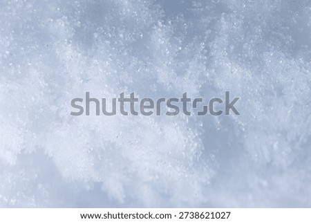 Soft focus snow and ice texture in bright white tones. Ideal for winter backgrounds, design, and artistic themes.