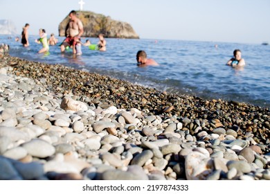 Soft Focus. Vacationers On Jasper Beach. Resort On Summer Season