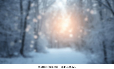 A soft focus winter scene featuring a snowy path through trees with golden sunlight glowing through the branches and decorative bokeh spots.
