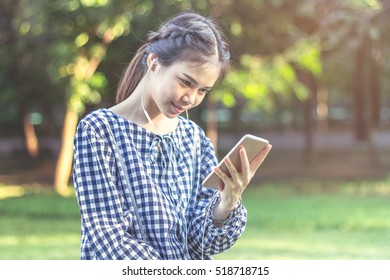 soft focus is woman using mobile smartphone, For relaxation. Vintage style