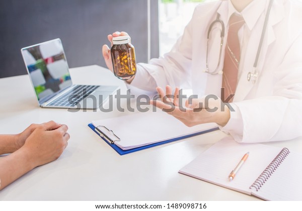 Soft Focusthe Doctor Advising Recommending Health Stock Photo
