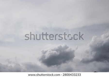 Soft Gray Clouds Drifting Through the Sky.