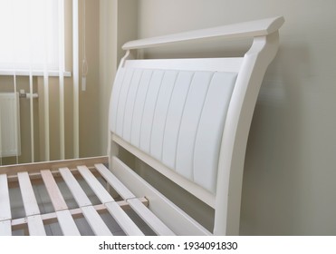 Soft Headboard Of A Wooden Bed