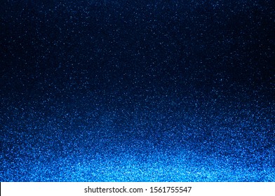 Soft image abstract bokeh dark blue,navy blue with light background.Blue,black color night light elegance,smooth backdrop,artwork design for new year,Christmas sparkling glittering or special day.