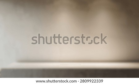 Soft light and shadow create an abstract pattern on a textured surface, suitable for backgrounds and design elements.