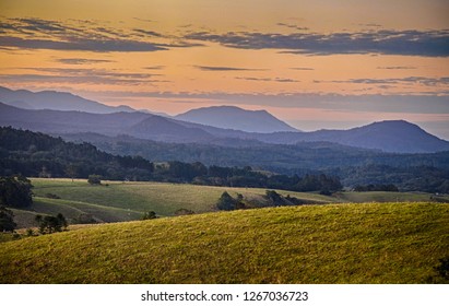 Soft Light From Sun Set Illuminates Rolling Foothills