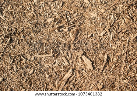 Soft, lightbrown mulch background or texture for paths, gardening