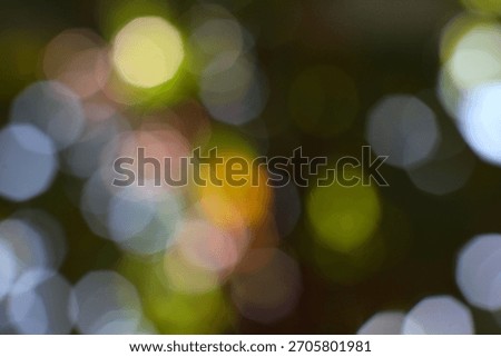 Soft luminous bokeh circles create a gentle atmospheric diffusion of light displaying a dreamy tranquil glow.
