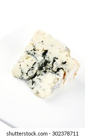 Soft Moldy Blue Cheese On White Background