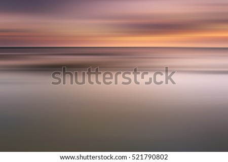 Soft motion blur sunset for background.