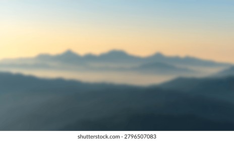A soft out of focus view of distant mountain peaks rising above a misty valley during a golden sunrise