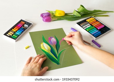 soft pastel drawing, painting of flowers. Pastel drawing tulips on paper, top view