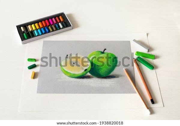 Soft pastel picture of green apples.\
Drawing colorful pictures by soft pastel. Top view.\
