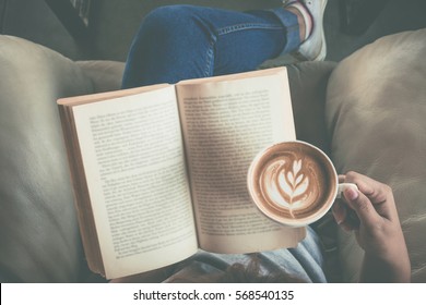 Soft Photo Of Young Girl Reading A Book And Drinking Coffee, Top View