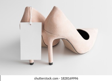 Soft Pink High Heels With White Price Tag Mockup.