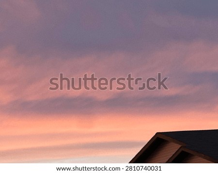 Soft Pink Sunset Clouds Creating a Colorful Evening Sky