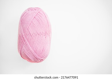 Soft Pink Woolen Yarn Isolated On White. High Quality Photo