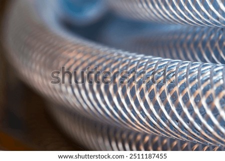 Soft PVC braided transparent compressor hose pipe, macro view