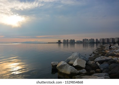 Soft sea, sunset and clouds