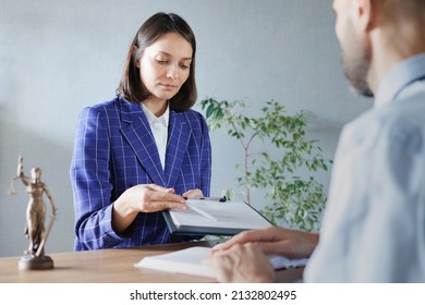 Soft Selective Focus, Female Lawyer At A Meeting With A Male Client In The Office Of The Law Office, Legal Advice Online. Resolution Of Disputes Of The Family Code During Divorce And Division Of