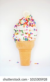 soft serve ice cream cone with rainbow sprinkles white background, Vermont creemee