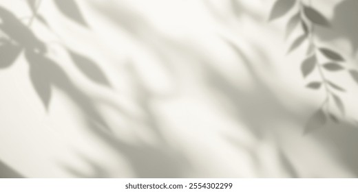 Soft shadows of green leaves cast on a light beige wall, creating a peaceful and serene atmosphere.
