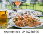 Soft Shell Crabs and oysters on table from Chesapeake Bay