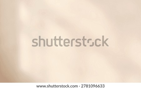 Soft sunlight casting gentle shadows on a beige wall, creating a calming and serene ambiance. Perfect for minimalist and interior design themes.
