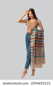 Soft tones, effortless elegance! This striped shawl is the perfect blend of comfort and style, adding a touch of warmth to any look. Stay chic, stay cozy!